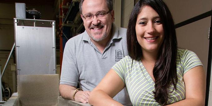 Tatiana Garcia and  Marcelo Garcia pose for a photo.